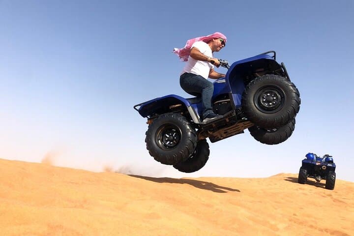 Conquer Dubai's Lahbab Red Dunes: ATV, Sandboarding & Camel Ride photo 2