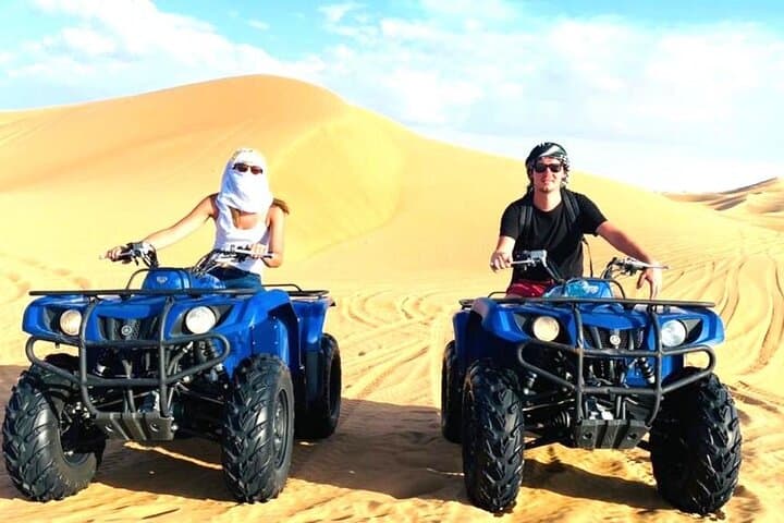Conquer Dubai's Lahbab Red Dunes: ATV, Sandboarding & Camel Ride photo 6