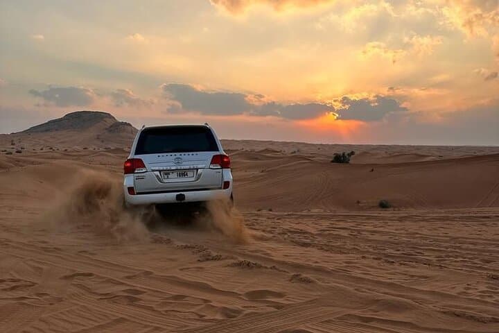 Red-Dune-Desert-Safari-in-Dubai-Red-Dune-Dune-Bashing-Camel-Ride-BBQ photo 2