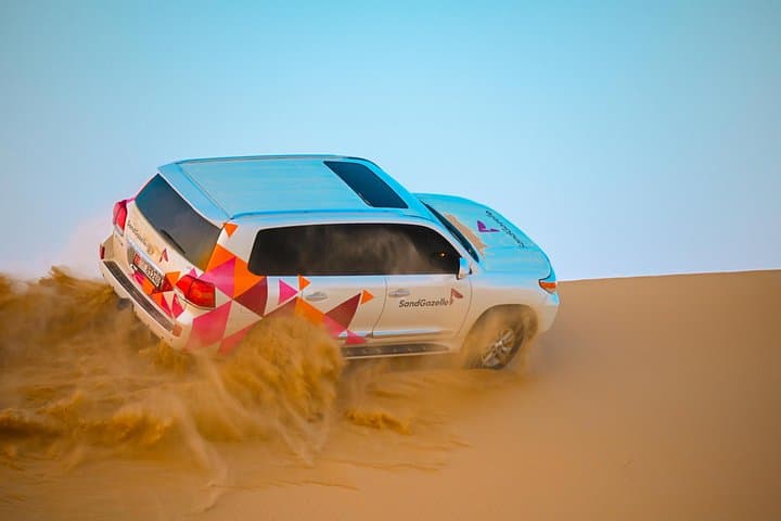 Morning Private Dune Bashing in Abu Dhabi: 4-Hour Desert Safari with Camel Ride & Sandboarding photo 1