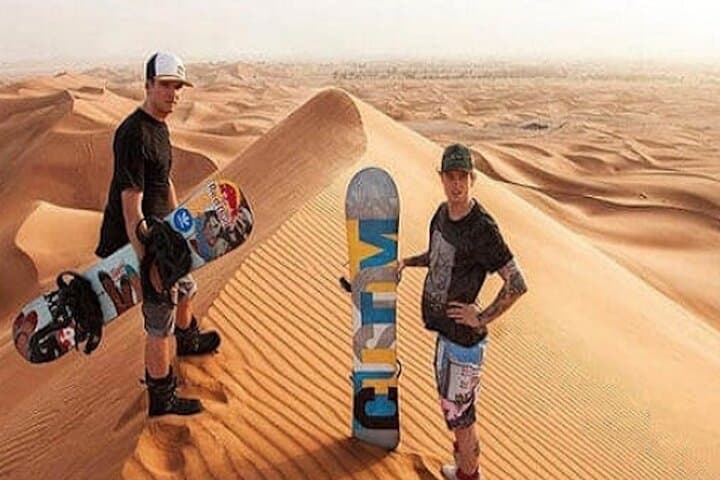 Red Dunes Desert Safari: ATV, Sandboarding, Camel Rides & Evening Show in Dubai photo 3