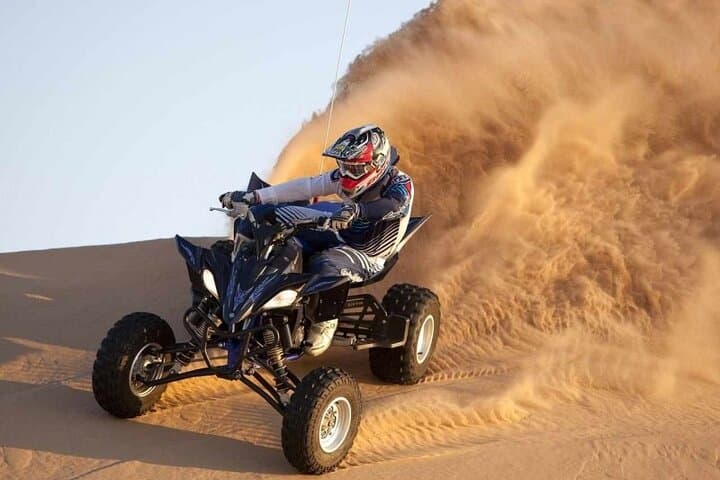 Red Dunes Desert Safari: ATV, Sandboarding, Camel Rides & Evening Show in Dubai