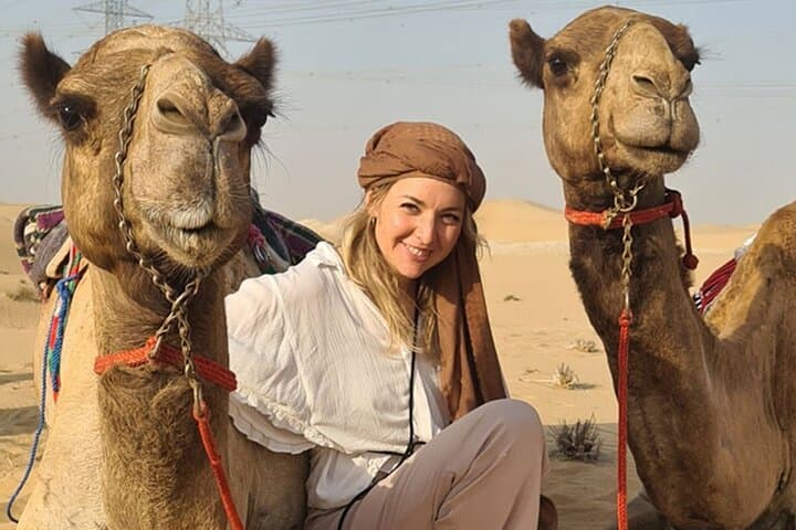 Red Dunes Desert Safari: ATV, Sandboarding, Camel Rides & Evening Show in Dubai photo 6
