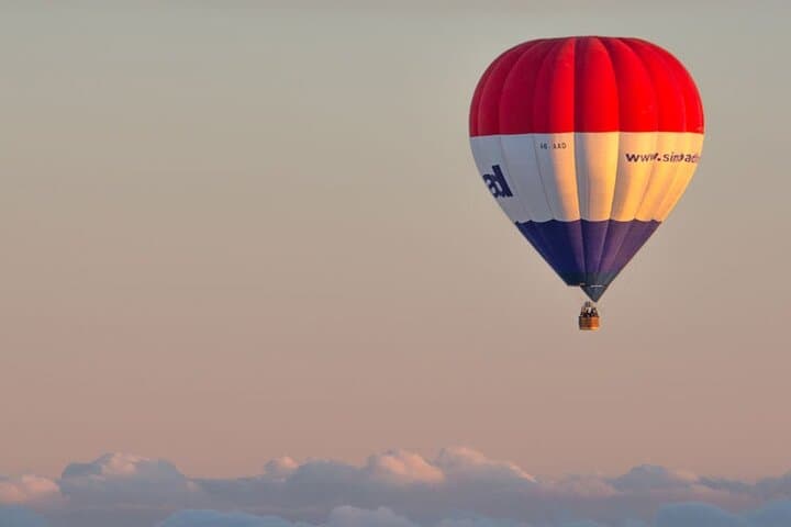 Sunrise Hot Air Balloon Over Dubai Desert with Falcon Show and Camel Ride photo 1