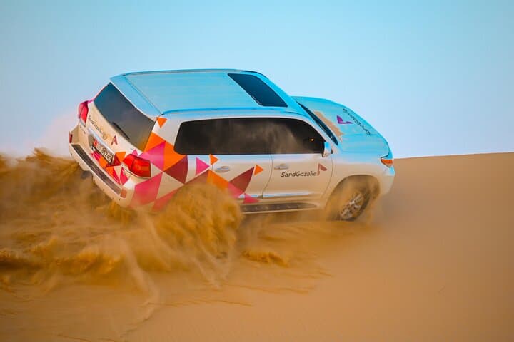 Abu Dhabi Evening Desert Safari: Dune Bashing, Camel Ride & BBQ Experience