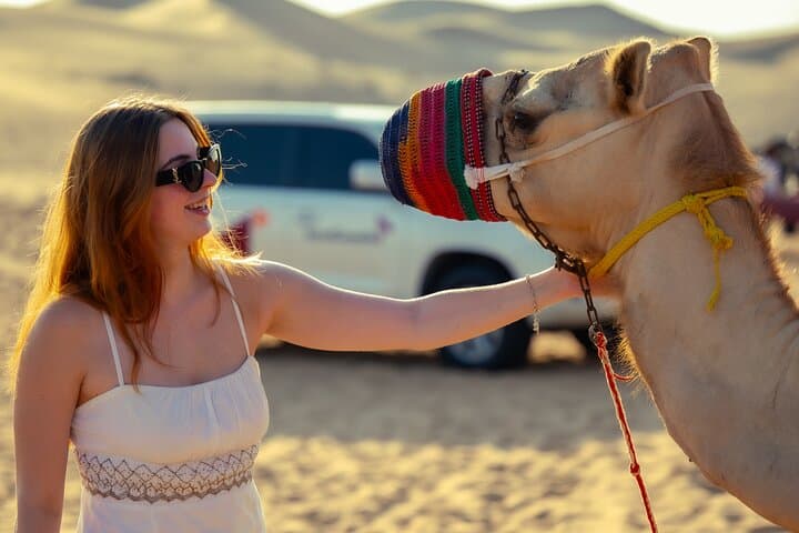 Abu Dhabi Evening Desert Safari: Dune Bashing, Camel Ride & BBQ Experience photo 2