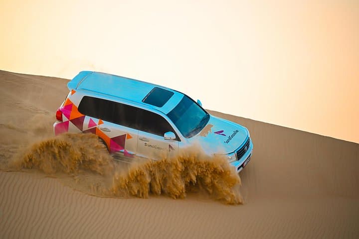 Morning Private Dune Bashing in Abu Dhabi: 4-Hour Desert Safari with Camel Ride & Sandboarding photo 3