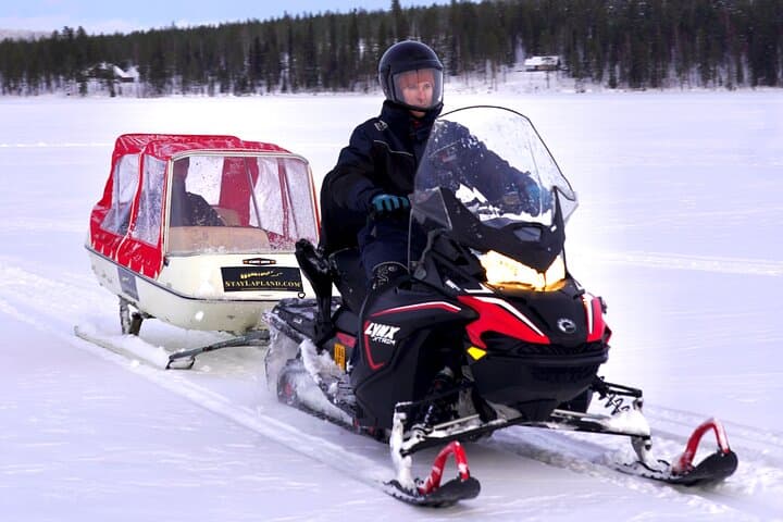 Lapland Northern Lights Sleigh Ride: Snowmobile-Pulled Aurora Tour near Rovaniemi photo 2