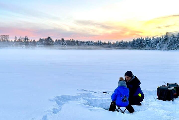 Explore Arctic Wilderness: Ice Fishing and Snowmobiling Adventure in Lapland photo 2
