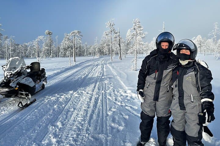 Explore Arctic Wilderness: Ice Fishing and Snowmobiling Adventure in Lapland photo 4