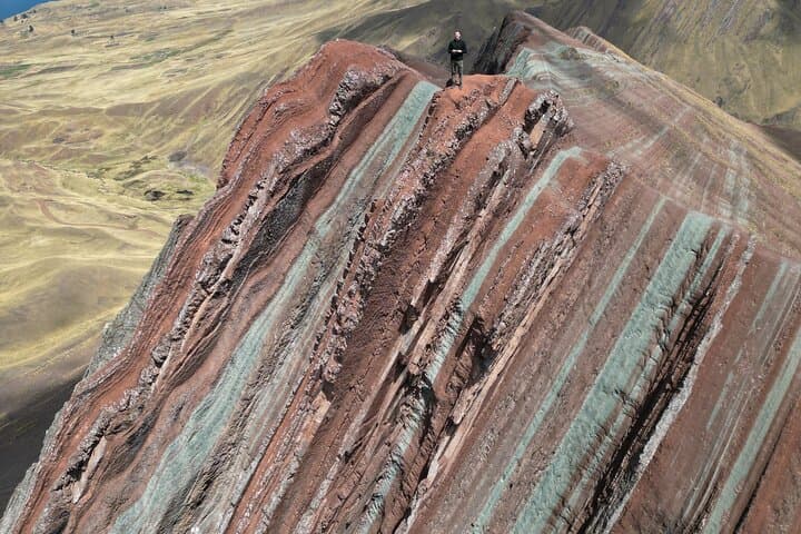 Private Guided Tour to Pallay Punchu Rainbow Mountain from Cusco photo 5