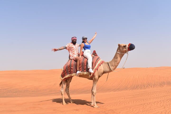 Dubai Red Dune Safari: Camel Ride, Sandboarding & BBQ Sunset Experience photo 5