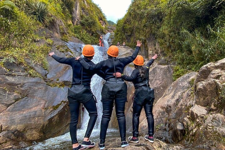Canyoning Chamana Waterfall: 35m Rappels & Natural Toboggans near Baños photo 4