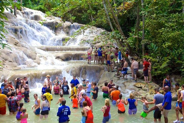 Climb Dunn's River & Dive the Blue Hole: Ocho Rios Day Trip with Jerk Lunch