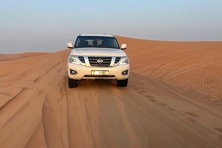 Dubai Red Dunes Desert Safari — Private Camel Ride, Sandboarding & BBQ Experience