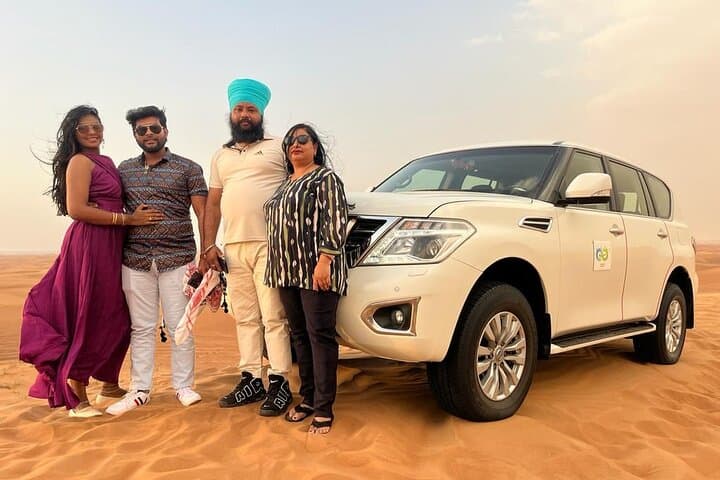 Dubai Red Dunes Desert Safari — Private Camel Ride, Sandboarding & BBQ Experience photo 4