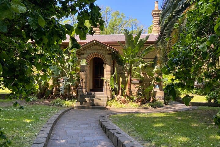 Fitzroy & Treasury Gardens Self‑Guided Walking Tour — Cook's Cottage, Conservatory & Hidden Garden Trails photo 4