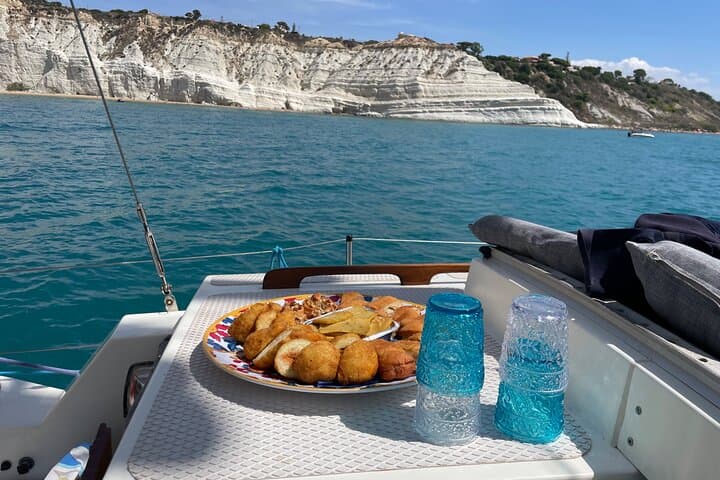Private Sailing Day Cruise to Scala dei Turchi from San Leone photo 2