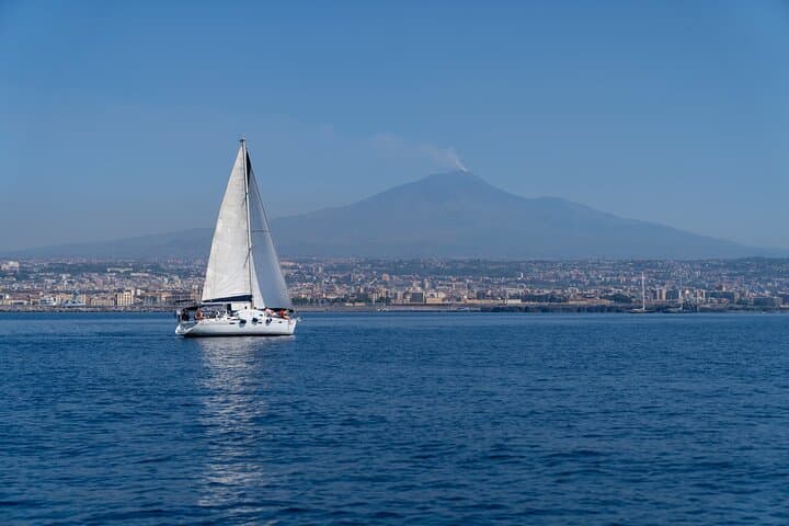 Catania Coastal Boat Tour with Snorkeling and Sicilian Aperitif
