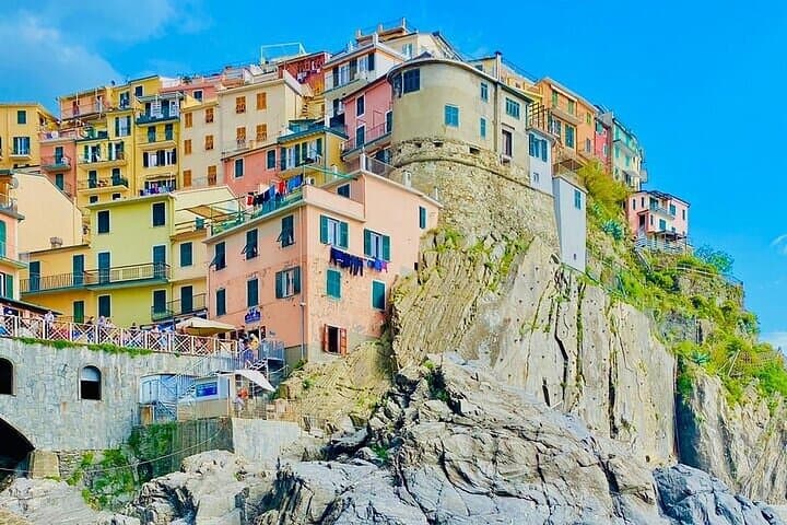 Cinque Terre by Train and Boat: Coastal Walks, Village Views & Local Flavors