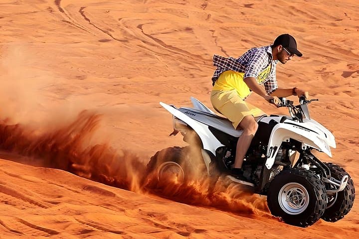 Dubai Morning Desert Safari: Quad Bike, Dune Bashing, Camel Ride & Sandboarding photo 1