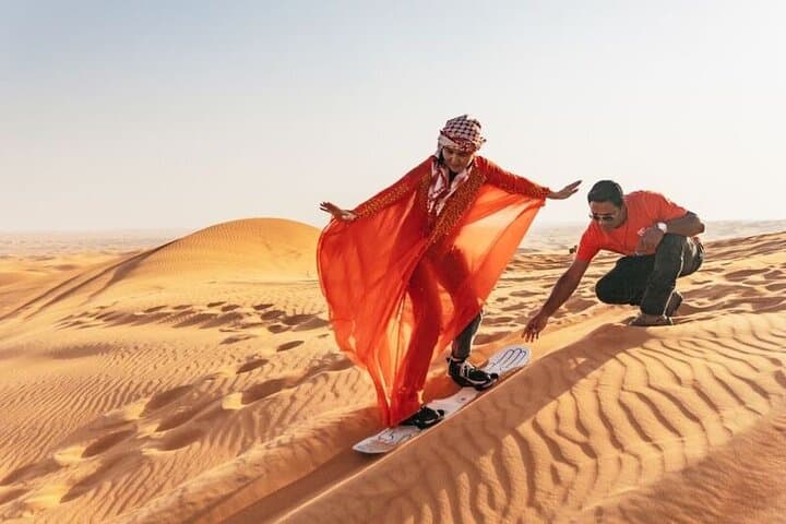Red Dunes Desert Safari in Dubai: ATV, Sandboarding, Camels & VIP Buffet photo 1