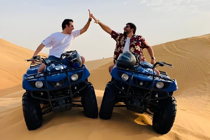 Red Dunes Desert Safari in Dubai: ATV, Sandboarding, Camels & VIP Buffet photo 3
