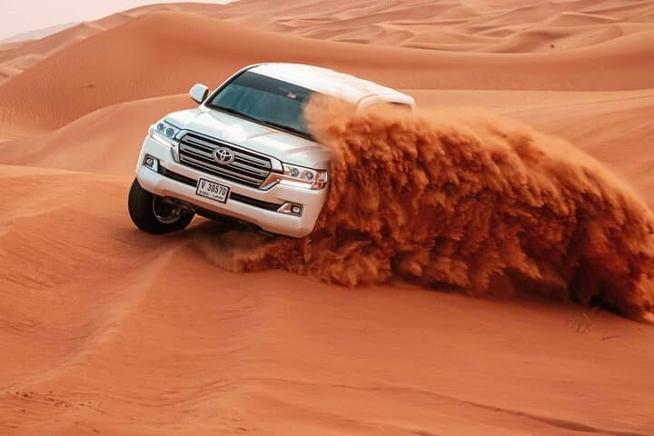 Dubai Evening Desert Safari: BBQ Dinner, Dune Bashing & Live Shows