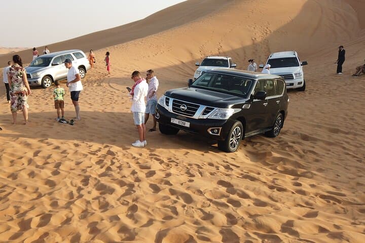 Dubai Desert Safari with Dinner: Evening Dune Bashing, Camp Show & BBQ photo 2