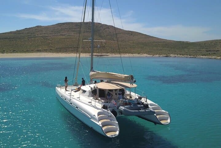 Mykonos Catamaran Private Day Cruise with Full Lunch & Open Bar to Rhenia and South Beaches