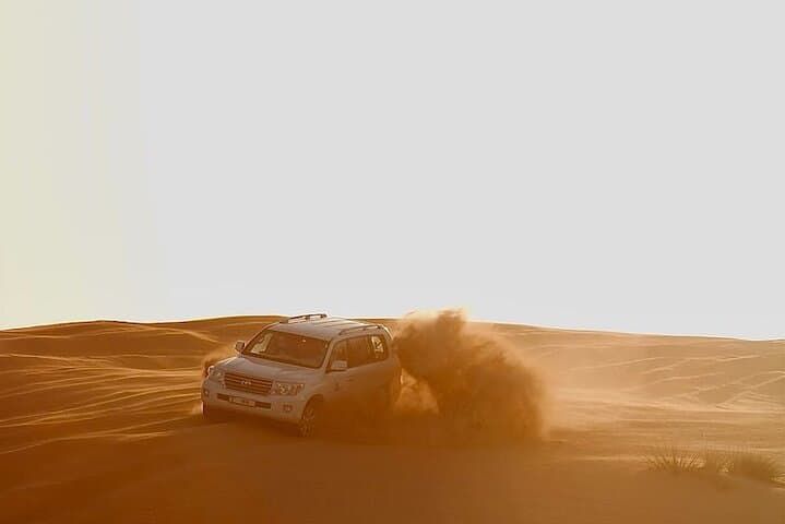 Dubai VIP Red Dunes Safari: Dune Bash, Camel Ride & 5-Star BBQ photo 2
