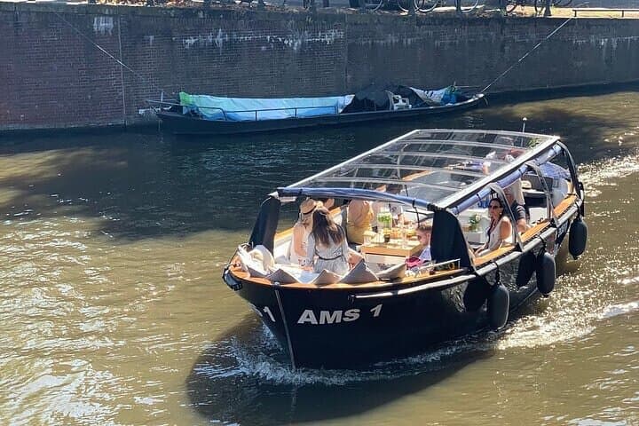 Glide Amsterdam’s Historic Canals: A Two-Hour Small-Group Cruise with Snacks and Drinks photo 6