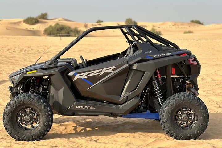 Drive Dubai's Red Dunes: Polaris RZR Dune Buggy Rental & Sunset Tours photo 3