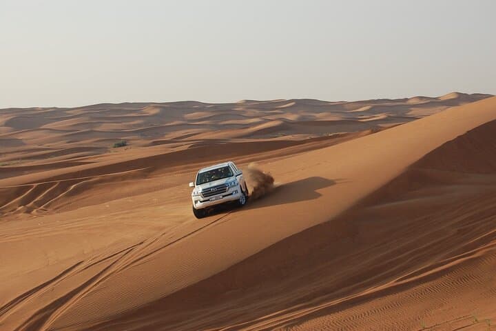 7-Hour Dubai Desert Safari: Sunset Dunes, Sandboarding & BBQ Camp photo 2