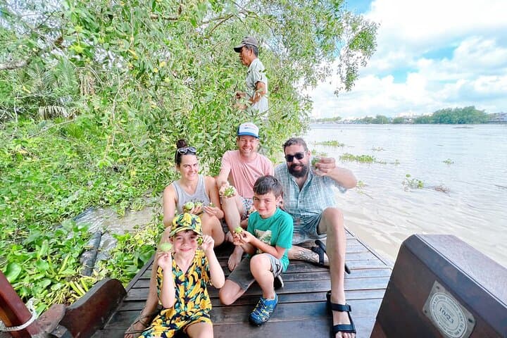 Mekong Delta Day Trip from Ho Chi Minh City — Boat Cruises, Coconut Candy & Vinh Trang Pagoda photo 2