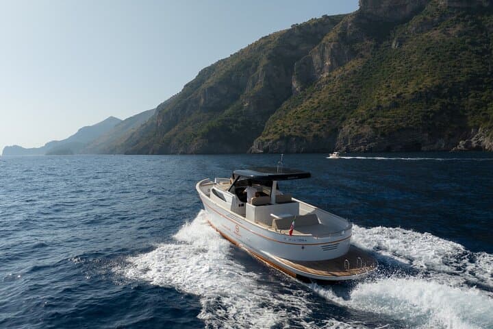 Ischia Boat Tour from Positano: Private Full-Day Sail to Thermal Springs & Aragonese Castle photo 2
