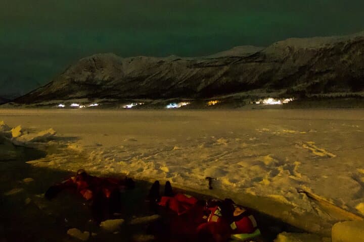 Float Under the Aurora: Arctic Ocean Night Floating in Ramfjord photo 3