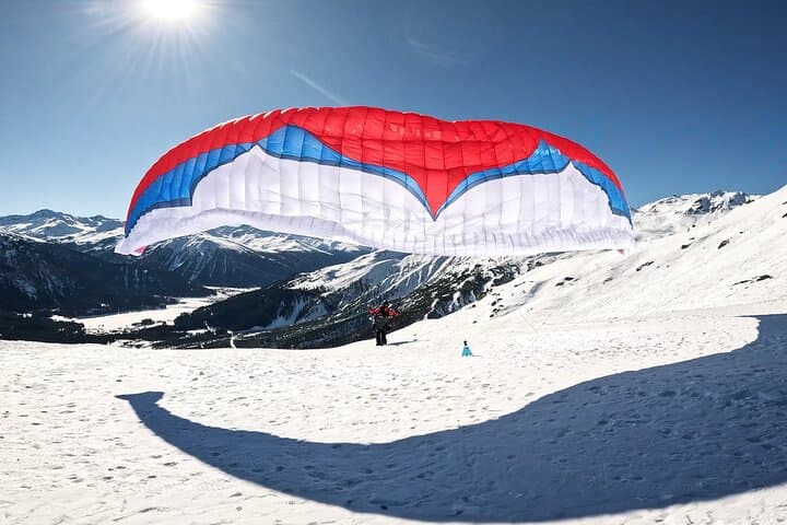 Soar Together Over Klosters: Tandem Paragliding for Two with Photos