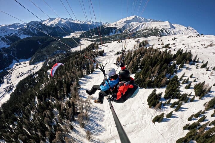 Soar Together Over Klosters: Tandem Paragliding for Two with Photos photo 3