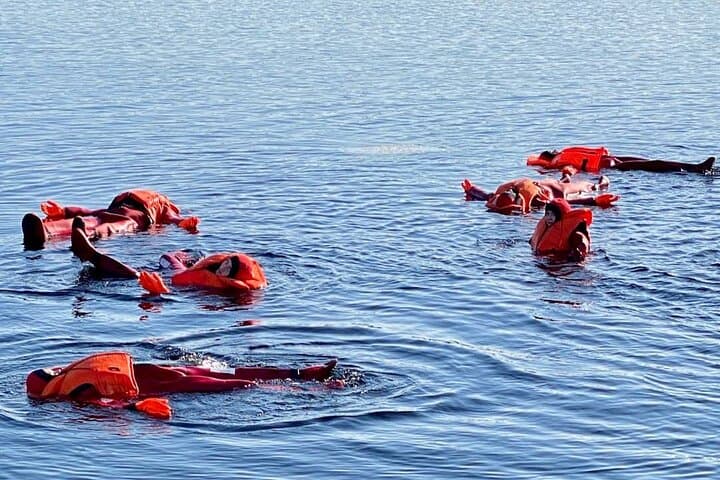 Arctic Ice Floating on Lake Saimaa — Guided Winter Float in Puumala photo 2