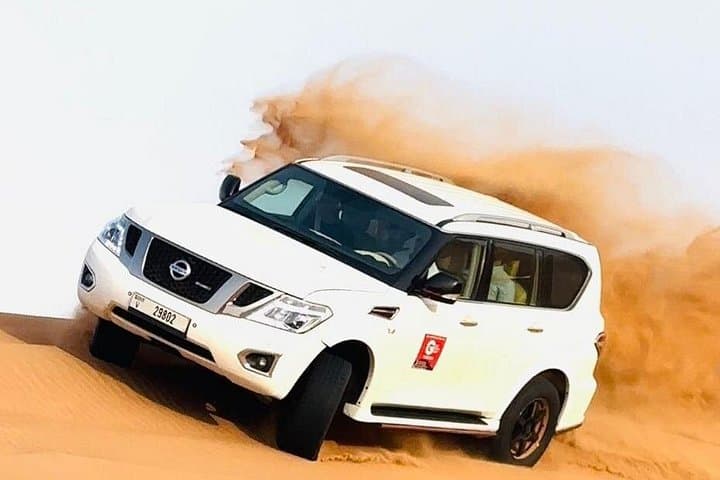Dubai Red Desert Private Family Safari: Dune Bashing, Camel Rides & Bedouin Dinner photo 1
