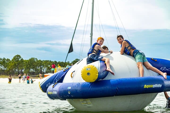 Catamaran to Shell Island: Inflatable Water Park, Snorkel & Dolphin Cruise in Panama City Beach photo 2