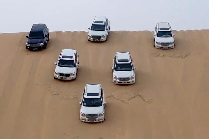 Half-Day Doha Desert Safari: Dune Bashing, Sandboarding & Inland Sea Excursion