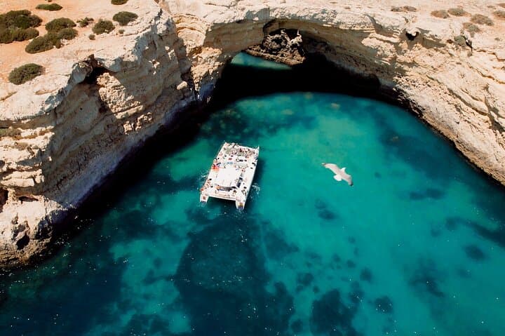Benagil Catamaran Cruise: Caves, Coastline & Swim from Albufeira photo 2