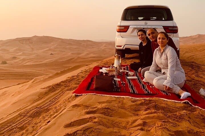 Sunrise Private Desert Safari Dubai: Camel Ride, Dune Bashing & Sandboarding photo 2