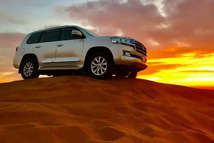 Sunrise Private Desert Safari Dubai: Camel Ride, Dune Bashing & Sandboarding photo 5