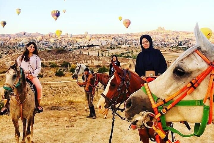 Cappadocia Sunset Horse Riding Through Valleys and Fairy Chimneys — Guided 2-Hour Tour photo 1