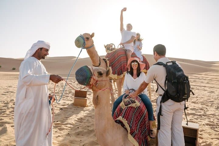 Abu Dhabi Desert Quad Bike Tour — Private Dune Ride, Camel & Sandboarding photo 5