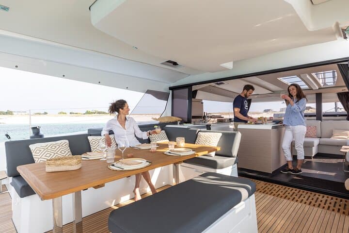Private Ultra-Luxury Catamaran Cruise from Mykonos to Rhenia photo 2