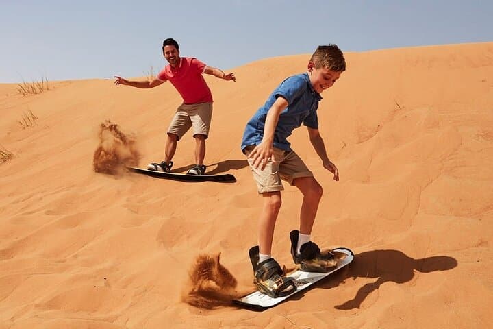 Abu Dhabi Desert Quad Bike Tour — Private Dune Ride, Camel & Sandboarding photo 4